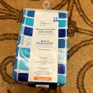 New shower curtain with hooks